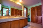Dual sinks and walk-in closets in the ensuite master bathroom